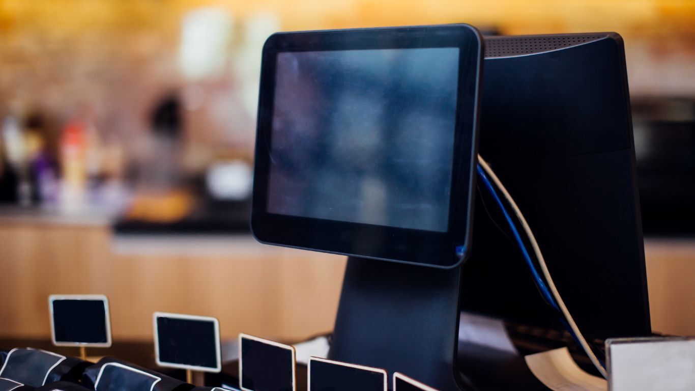 Retail point-of-sale terminal illustrating the limits of generic payment tools compared with contractor workflows.