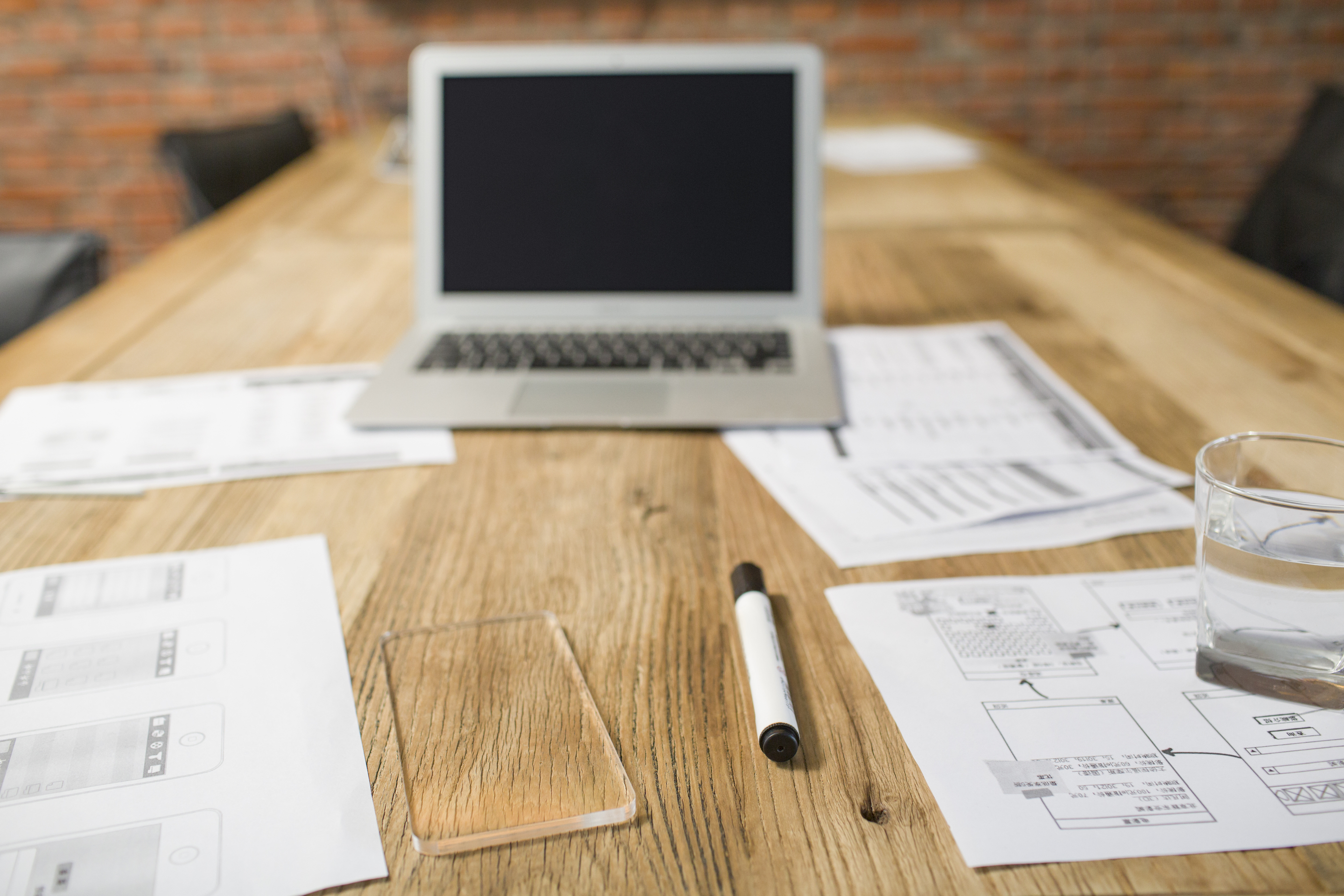Laptop and training documents for fast non-tech staff onboarding tactics