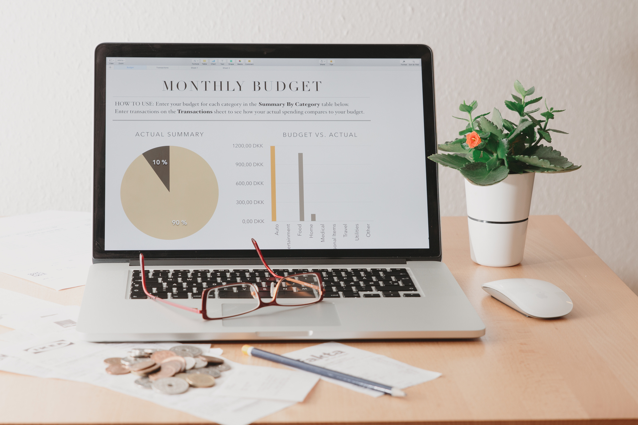 Laptop job profitability tracking highlighting the core financial numbers