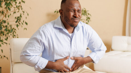 Mature man suffering from bellyache at home 2025 03 18 18 41 24 utc