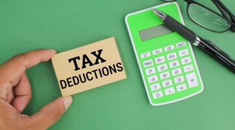 Pen calculator glasses and paper with the word t 2026 01 08 06 23 39 utc